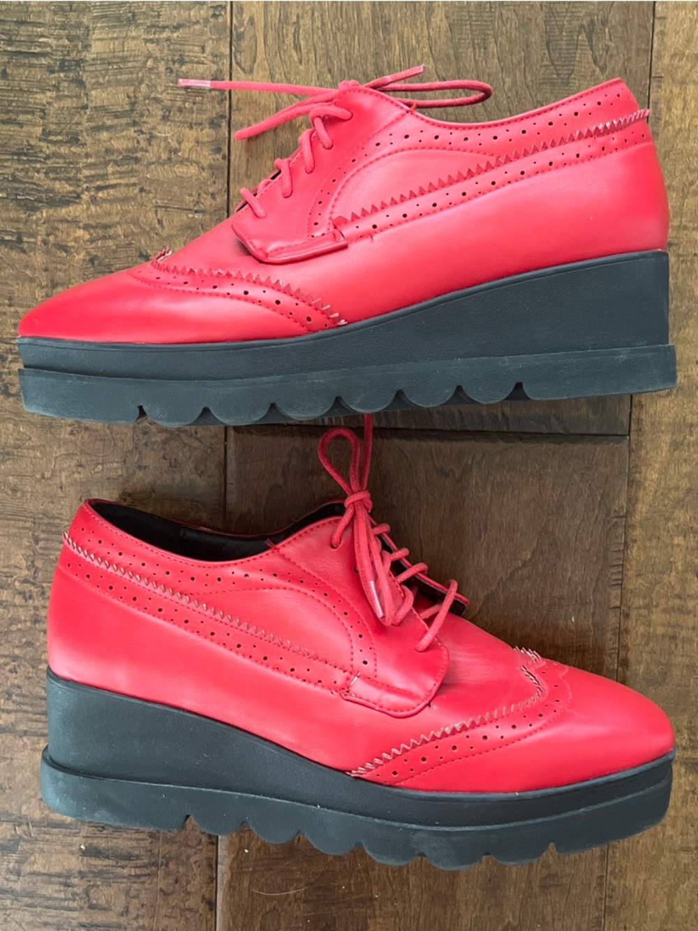 Red faux leather lace up lug wingtip derbies with platform rubber lug soles